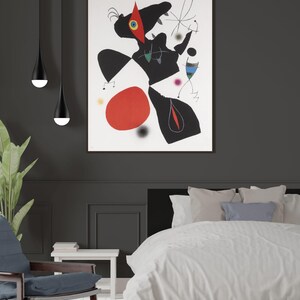 May include: A black and white abstract painting with red, blue and yellow accents. The painting features a large, black figure with a red beak and a white eye. The figure is surrounded by smaller, abstract shapes and lines.