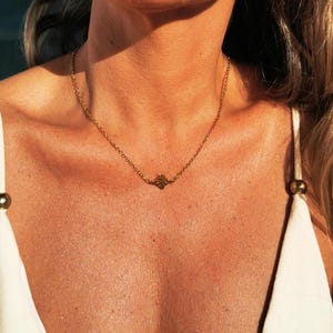 Elegant Minimalist gold choker necklace handmade with boho charm, the perfect dainty and personalized gift for her or a birthday gift