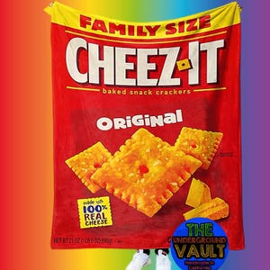 May include: A red and yellow blanket with a large image of a Cheez-It box. The box says "Family Size Cheez-It Baked Snack Crackers Original" and "Made with 100% Real Cheese". The net weight is 21 oz (1 lb 5 oz) or 595g. The blanket also has a blue circle with the text "The Underground Vault Handmade in California".