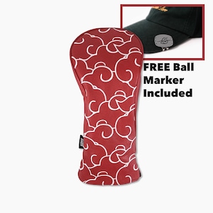 May include: Red and white golf club head cover with a cloud pattern. A black cap with a logo is shown in the corner. Text reads "FREE Ball Marker Included".