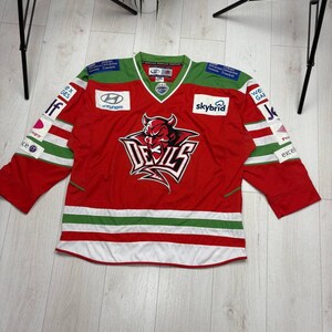 Seltenes Cardiff Devils Eishockey-Trikot-Set aus den 2010er Jahren