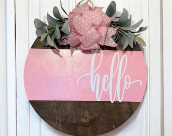 Letrero de puerta de madera de 18 pulgadas con la palabra "Hola"