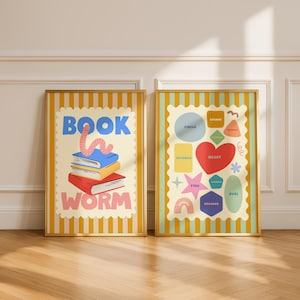 May include: Two framed art prints. One features a stack of books with a worm and the words "BOOK WORM". The other print displays various shapes, including a heart, star, and hexagon, with labels like "CIRCLE" and "OVAL". Both have gold frames.