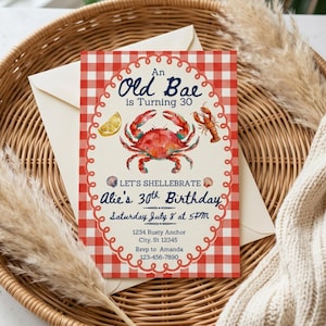 May include: A birthday invitation with a red and white gingham border. The invitation features a watercolour crab, lobster, and lemon illustration. Text reads "An Old Bae is Turning 30" and "Alie's 30th Birthday".