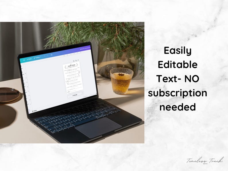 May include: A laptop with a lit screen displaying a document, next to a glass of tea. The text on the right says "Easily Editable Text- NO subscription needed". A sprig of greenery is in the background.