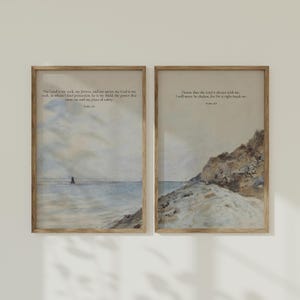 May include: Two framed prints with watercolor paintings of seascapes and inspirational quotes from the Bible. The first print features a quote from Psalm 18:2, "The Lord is my rock, my fortress, and my savior; my God is my rock, in whom I find protection. He is my shield, the power that saves me and my place of safety." The second print features a quote from Psalm 16:8, "I know that the Lord is always with me. I will never be shaken, for He is right beside me."