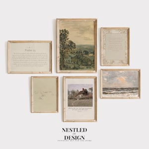 May include: A collection of framed art prints in various sizes and styles. The prints feature landscape paintings, text from Psalm 23, and other pastoral scenes. The frames are a light wood color, and the overall aesthetic is vintage and rustic.