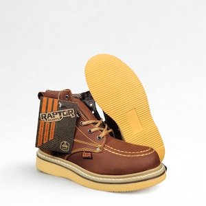 May include: Brown leather work boots with a tan sole and laces. The boots have a tag that reads "RAPTOR BOOTS". The sole is visible, and the boots appear to be new.