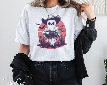 Western Halloween Cowboy Ghost T-Shirt Design | Spooky Skeleton Ghost with Gun in Desert Scene | Digital PNG Download for Halloween Shirt