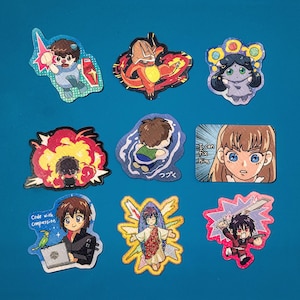 May include: A collection of nine colorful anime-style stickers on a blue background. The stickers feature various characters in action poses, including a character with a sword, a character with a laptop, and a character in an explosion. Some stickers have text.