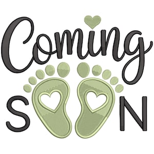 May include: An embroidered design with the words "Coming Soon" in black script. Two baby footprints in light green with heart cutouts are below the text. A light green heart is above the word "Coming".