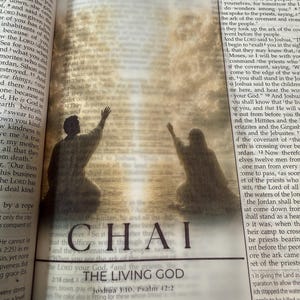 May include: A translucent page overlay featuring the word EL at the top and CHAI at the bottom in black serif font. Between the text, a sepia-toned illustration shows two figures kneeling with arms raised toward a bright, cloudy sky.