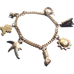 Vintage Mexican Silver 1950s Souvenir Charm Bracelet 7 Charms Aztec, Mexico, Peru Theme image 1