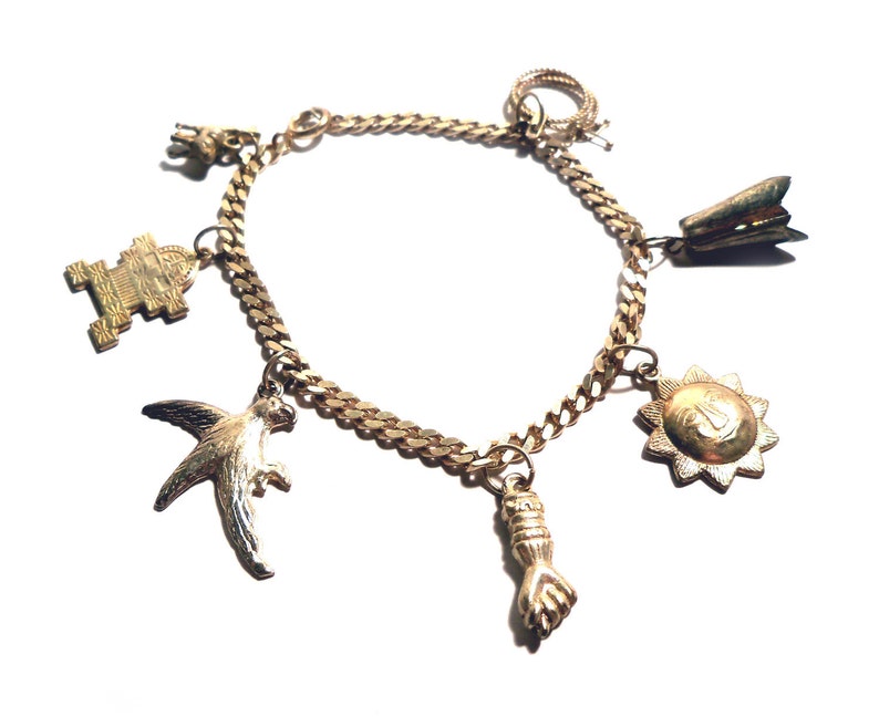 Vintage Mexican Silver 1950s Souvenir Charm Bracelet 7 Charms Aztec, Mexico, Peru Theme image 1