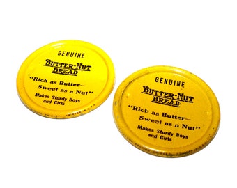 Lata de pan de mantequilla y nueces vintage Clickers, juguete publicitario