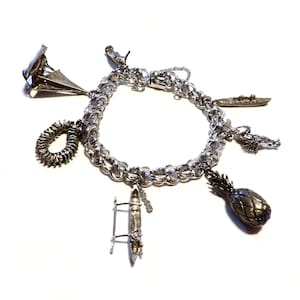 Vintage Sterling Silver Hawaiian Theme Charm Bracelet Hawaii Lei, Hula Girl, Sailboat, Pineapple, king kamehameha, 7 Sterling Charms