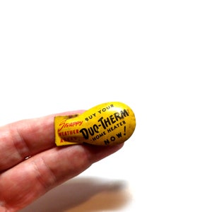 Vintage Tin Litho Metal Toy CLICKER - Snappy Weather Ahead, Buy Your Duo Therm Home Heater Now Advertising Noise Maker