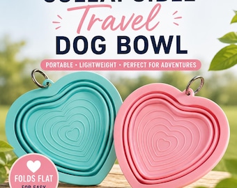 May include: Two heart-shaped collapsible bowls in teal and pink, each featuring a metal ring attachment. The text reads COLLAPSIBLE TRAVEL DOG BOWL, PORTABLE LIGHTWEIGHT PERFECT FOR ADVENTURES, FOLDS FLAT FOR EASY TRAVEL, and PERFECT FOR FOOD OR WATER.