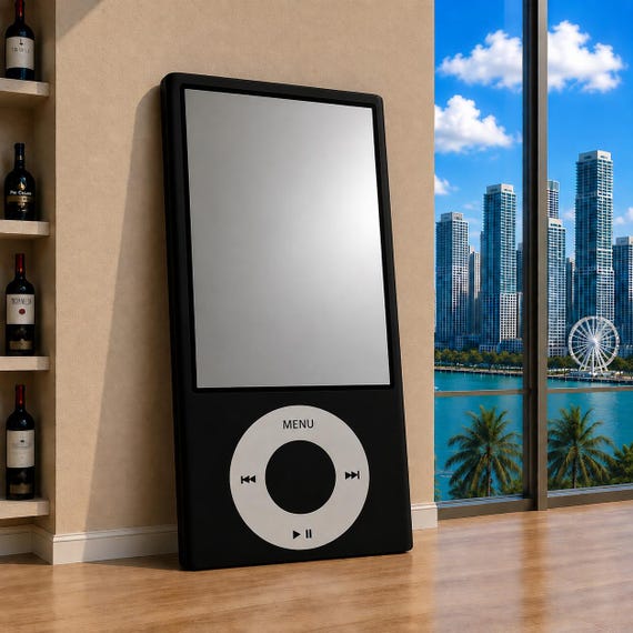 A handmade wall mirror shaped like a classic iPod — functional decor that hits Y2K nostalgia hard and doubles as a genuine conversation piece.