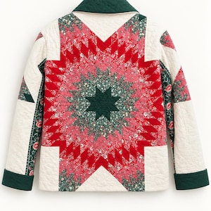 May include: A quilted jacket featuring a central star pattern in shades of red, pink, and green floral fabric. The garment has a solid dark green collar and cuffs, with off-white quilted panels on the sides and sleeves, showcasing intricate stitching.