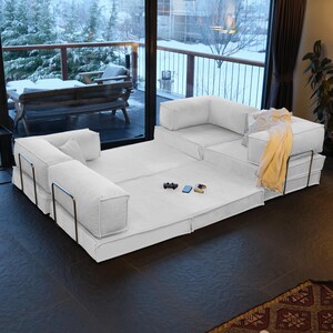 A stylish velvet teddy sofa with sleeper functionality and washable design. Minimalist yet incredibly cozy, it's perfect for any contemporary livingroom.