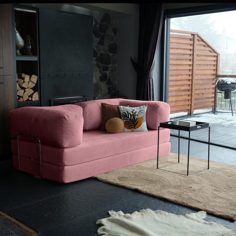 Livingroom teddy couch displayed with layered pillows, creating a warm and inviting centerpiece for modern homes.