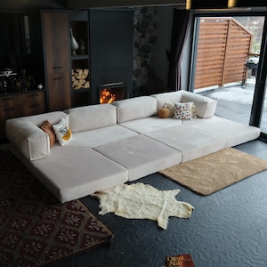 A soft teddy sofa bed crafted for livingroom comfort. Its velvet teddy texture and modular layout make it perfect for hosting guests or relaxing alone. With washable covers and full-body teddy softness, it's a must-have for any cozy setup.