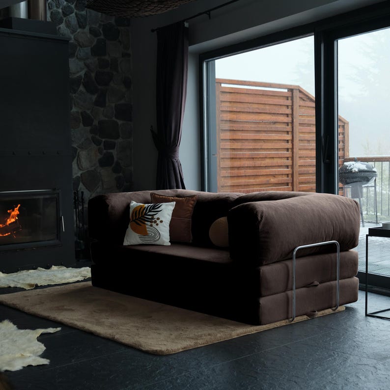 Custom floor teddy sofa arranged with rugs and pillows, blending timeless design with cozy seating for family spaces.