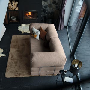 Modular teddy floor sofa bed displayed in lounge and bed modes, perfect for multifunctional modern apartments.