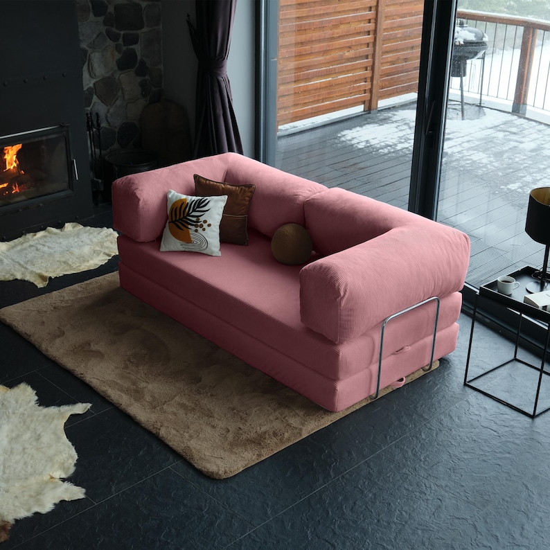 Custom teddy sofa bed arranged in lounge and bed modes, providing cozy seating and guest-ready practicality.