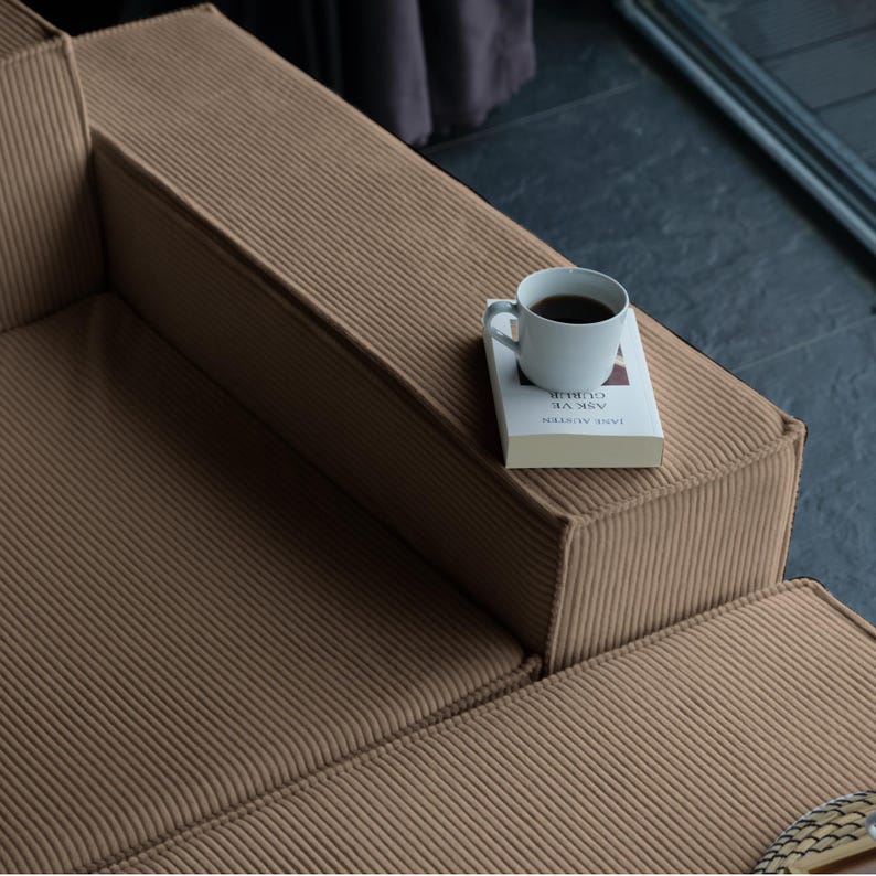 Enjoy teddy comfort without compromising style. This minimalist sectional sofa features soft, washable teddy fabric, perfect for creating a serene, inviting floor seating area.