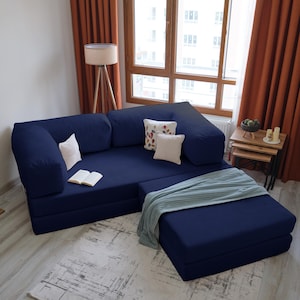 This soft teddy modular sofa bed combines comfort, flexibility, and a cozy floor-friendly design.