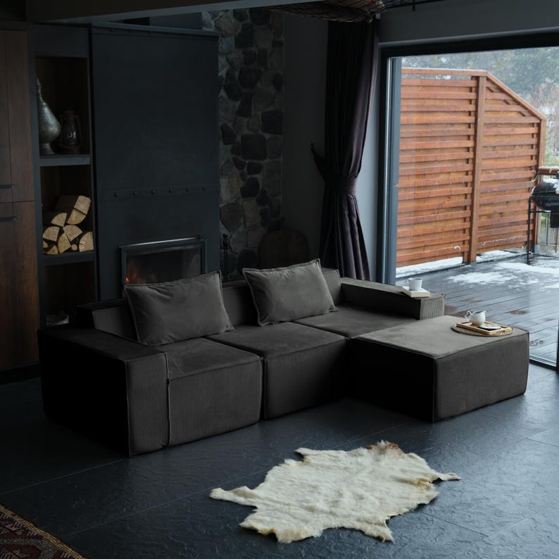 This modern teddy floor sofa features washable covers and ultra-soft teddy cushions. Designed for everyday comfort, it’s the perfect cozy couch for minimalist and warm living spaces.