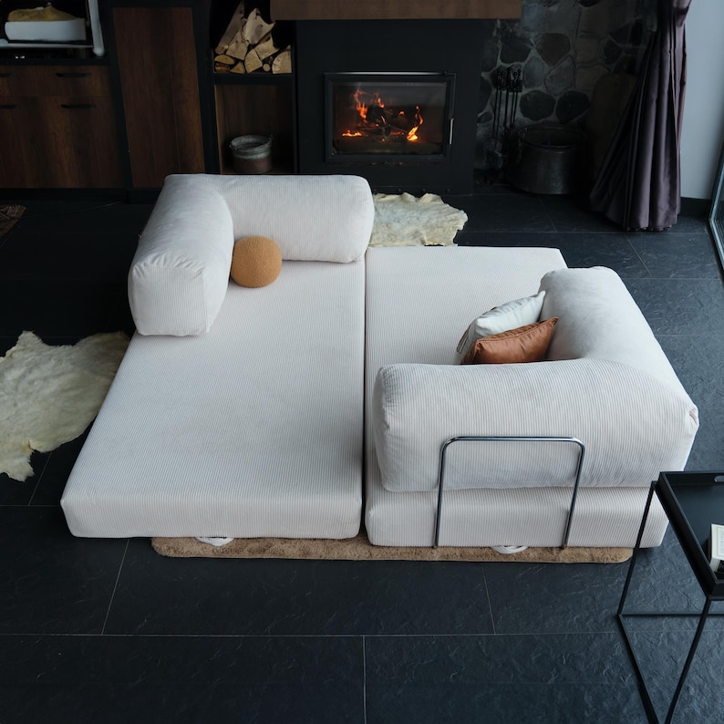 Modular soft teddy sofa shown with foldable cushions, perfect for flexible floor seating that can double as a nap-ready bed or family hangout zone.