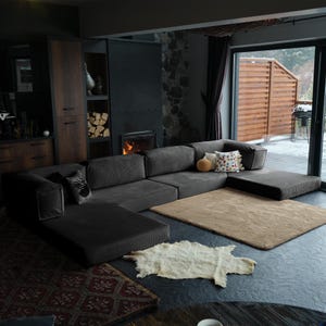 A miniature convertible sofa crafted with teddy-textured corduroy. Handmade L-shaped furniture that fits perfectly into compact living areas with style and comfort.