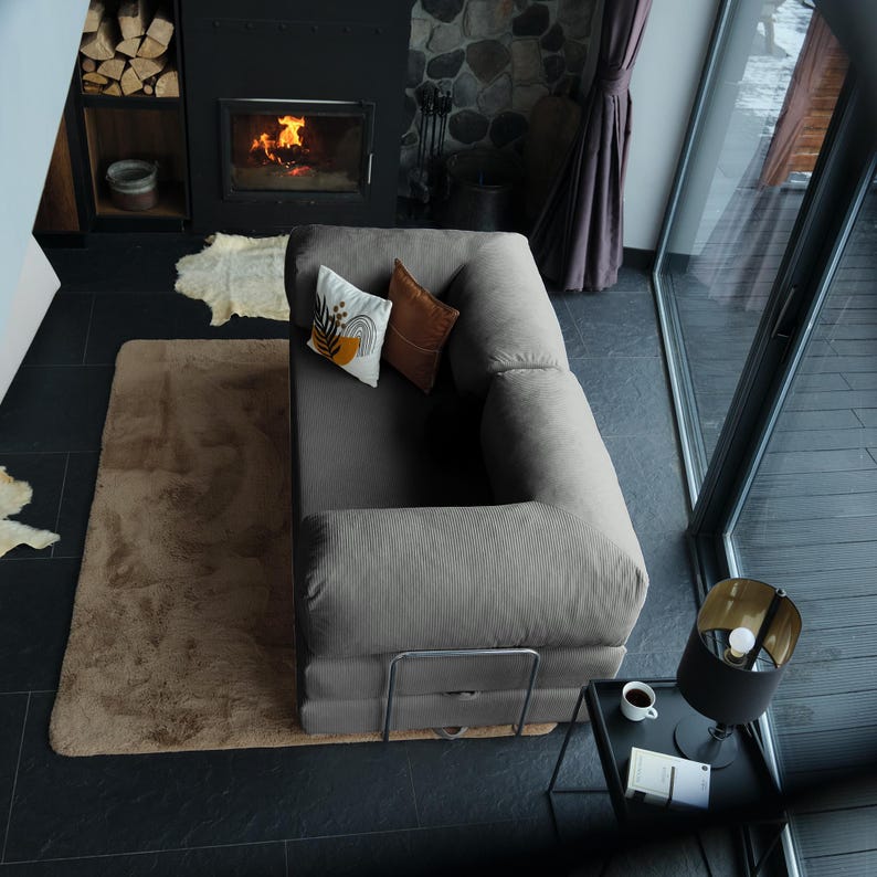 Folded sofa modules arranged in a corner setup, showing the adaptability of this washable teddy couch from lounge to sleep surface in minutes.