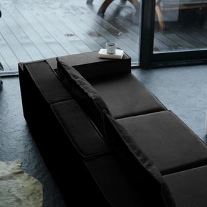 This teddy floor sofa is both modern and cozy. Washable teddy fabric, deep cushions, and a low profile make it the perfect couch for comfort-first livingroom decor.