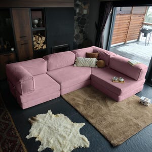 Washable teddy modular couch styled with neutral tones, blending practical care with soft, modern design.