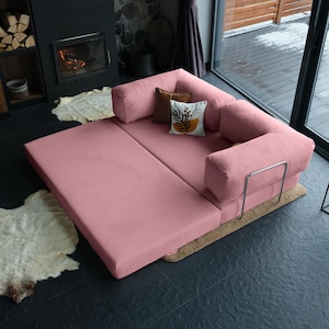 Plush teddy sleeper sofa designed as a modular sofa bed for easy transformation and ultimate relaxation. The teddy fabric cushions add warmth and softness, making this teddy sofa a perfect choice for versatile living rooms.