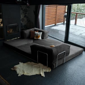 This teddy-inspired miniature convertible sofa offers soft corduroy comfort in a stylish L-shaped design. Handmade and perfect for small, modern homes.