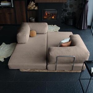 Custom corduroy teddy sofa styled in neutral tones, combining durable fabric with cozy softness for everyday comfort.