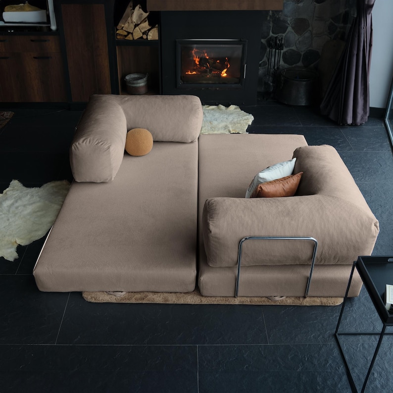 Custom corduroy teddy sofa styled in neutral tones, combining durable fabric with cozy softness for everyday comfort.