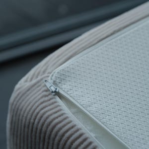 This teddy-inspired minimalist floor sofa blends modular functionality with plush comfort. Washable and low-profile, it's the ideal centerpiece for calm and comfortable livingroom decor.