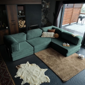 This washable soft teddy sofa, made with creamy corduroy fabric, offers a luxurious yet relaxed place to unwind, ideal for modern homes that prioritize both comfort and clean design.