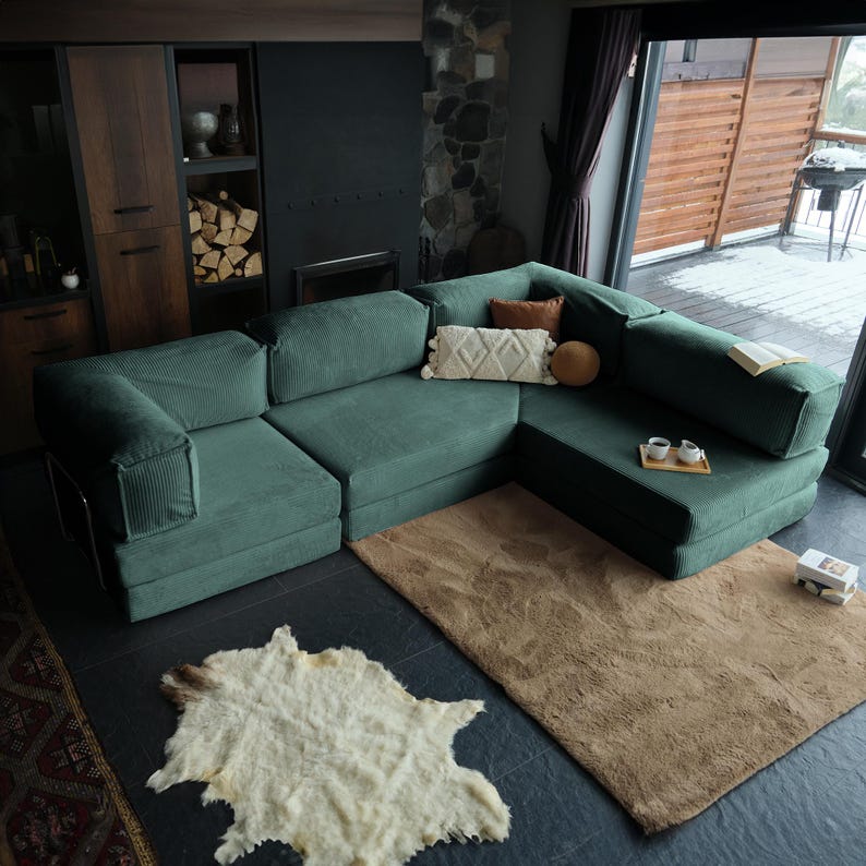 This washable soft teddy sofa, made with creamy corduroy fabric, offers a luxurious yet relaxed place to unwind, ideal for modern homes that prioritize both comfort and clean design.