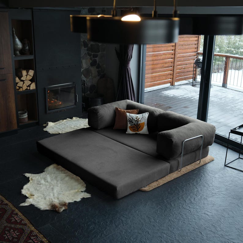 Modular corduroy teddy couch arranged with washable cushions, offering flexible seating and sleeping options for homes that love warmth and versatility.