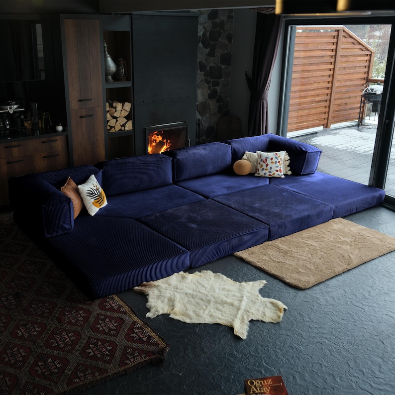 Designed with soft living in mind, this teddy sofa bed sits low to the ground for a relaxed floor feel. Wrapped in corduroy teddy fabric, it’s modular, washable, and endlessly comfy — a teddy couch made for cozy modern homes.