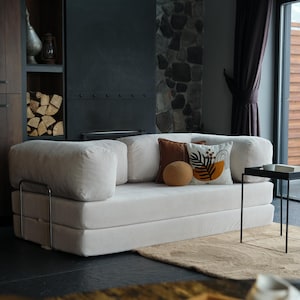 Traditional corner teddy sofa styled with neutral décor, highlighting classic comfort and family-friendly appeal.