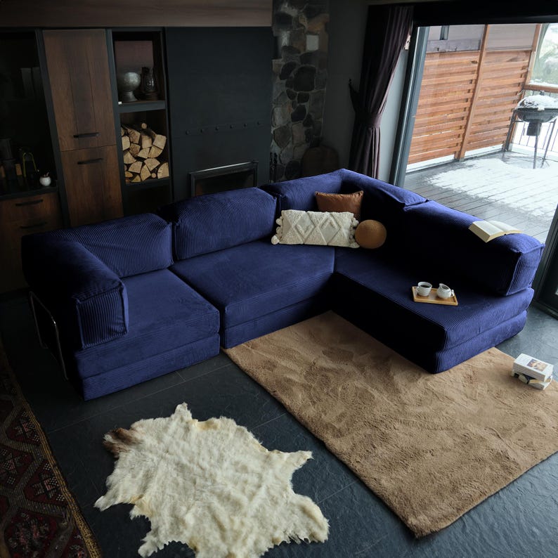 Experience all-day relaxation with this floor-level teddy sofa bed. Its soft corduroy teddy texture offers maximum comfort, while the modular structure fits any room. A washable and cozy teddy couch perfect for minimalist or laid-back interiors.