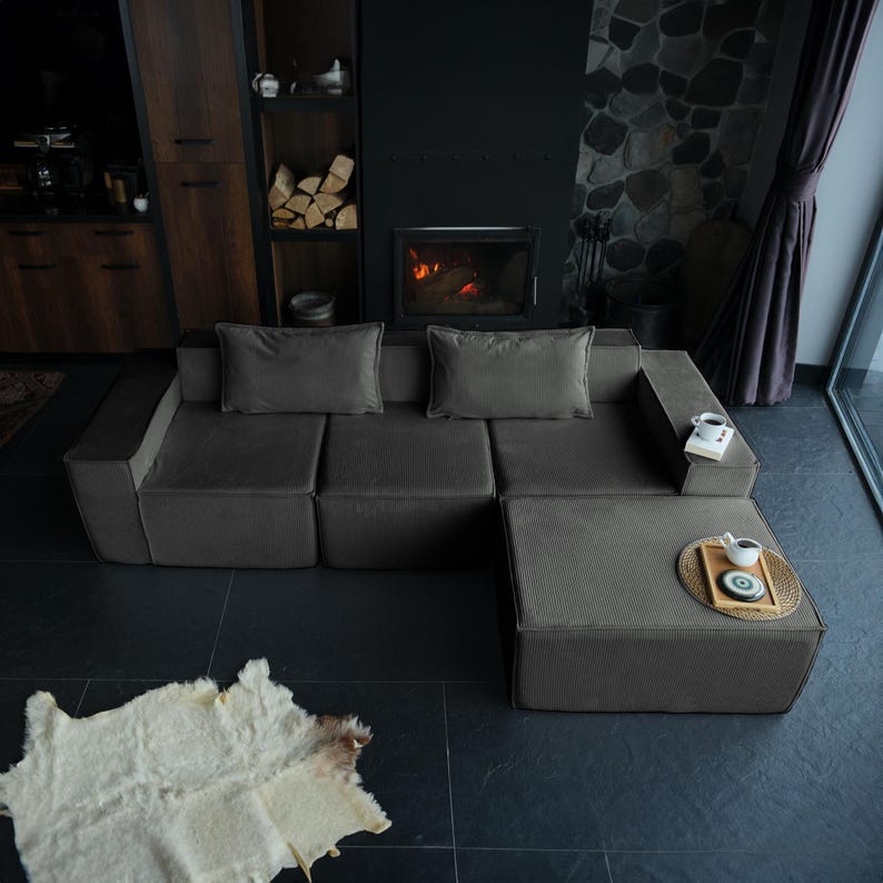 A soft teddy couch with a low, floor-friendly design. Washable and deeply cushioned, this modern sofa couch brings cozy texture and practicality to your home.